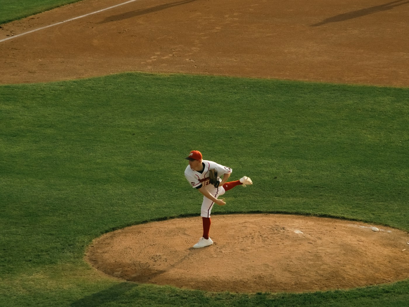 A pitcher throwing from the mound